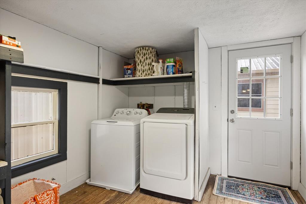 310 West 6th Street Tolar, TX 76476 - Photo 19 of 27 a utility room with dryer and washer