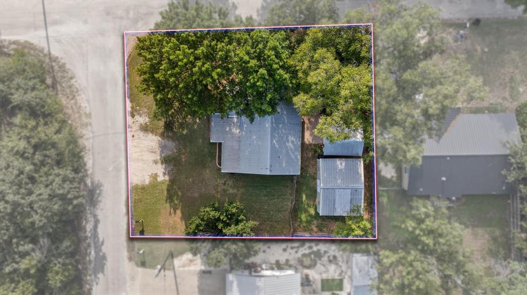 310 West 6th Street Tolar, TX 76476 - Photo 22 of 27 front view of a house with a tree