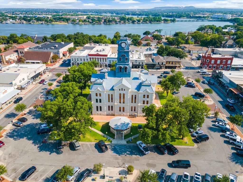 310 West 6th Street Tolar, TX 76476 - Photo 25 of 27 an aerial view of a city with lots of residential buildings