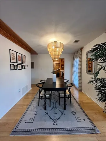 a living room with furniture rug and window