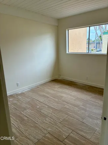 a view of a room that has a window