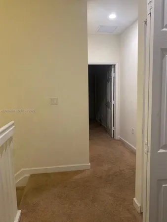 a bathroom with a sink a toilet and vanity