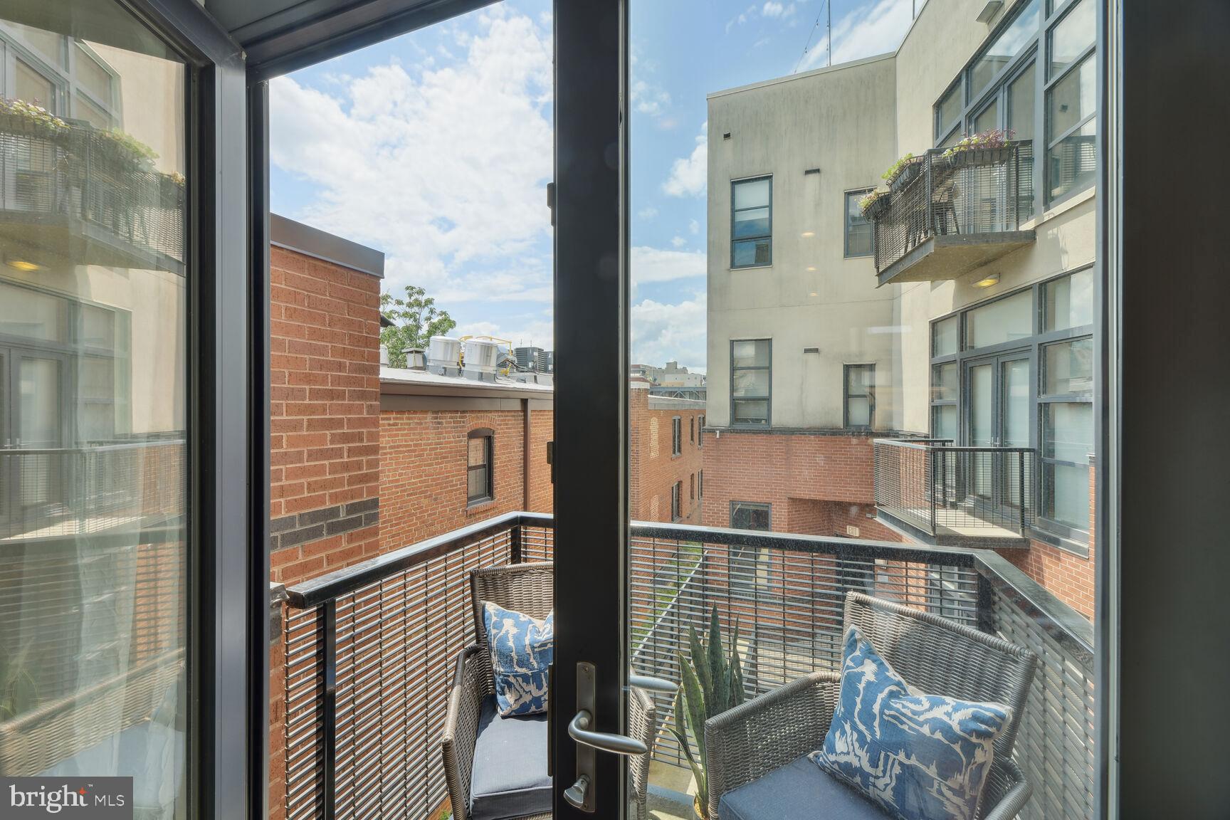 2426 Ontario Road Northwest, Unit 304 Washington, DC 20009 - Photo 13 of 43 Balcony off the Kitchen