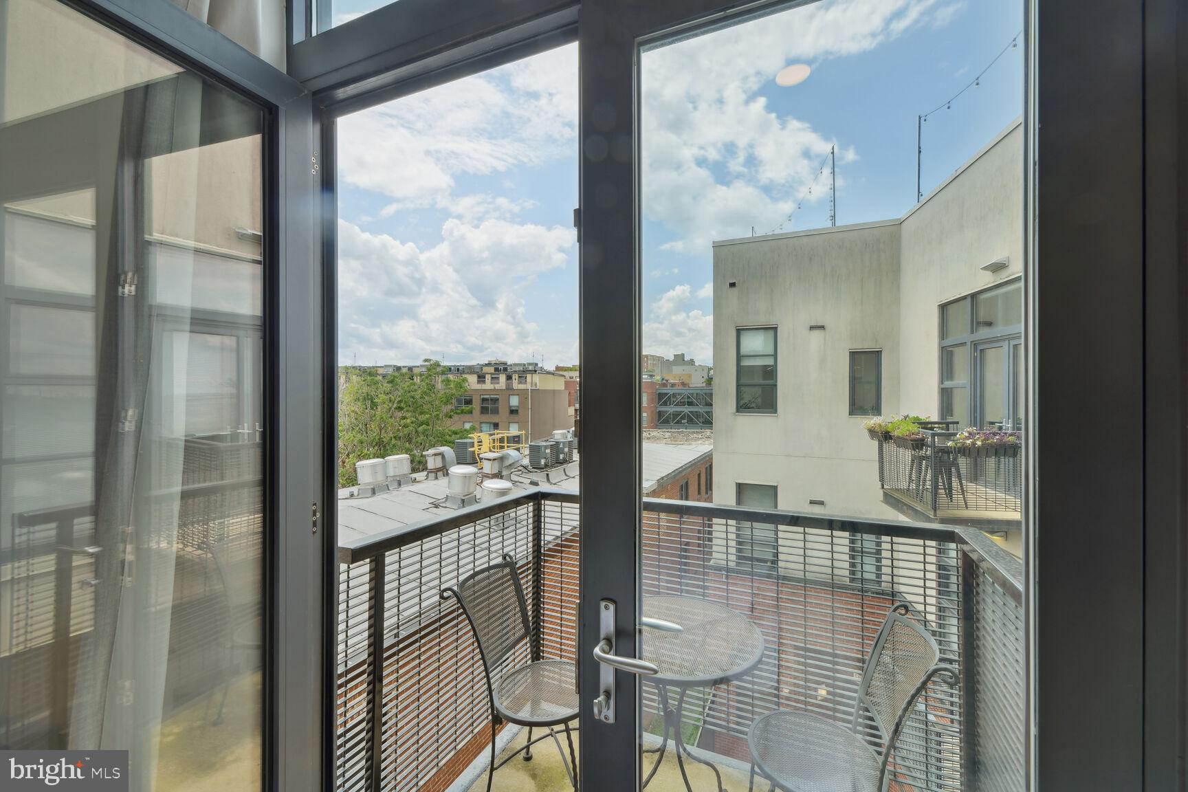 2426 Ontario Road Northwest, Unit 304 Washington, DC 20009 - Photo 21 of 43 Balcony off 2nd Bedroom