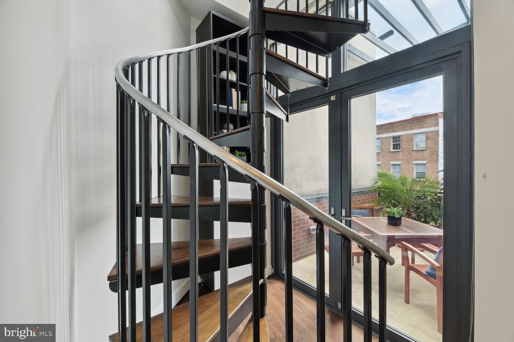 2426 Ontario Road Northwest, Unit 304 Washington, DC 20009 - Photo 26 of 43 Spiral Stairs to the Loft