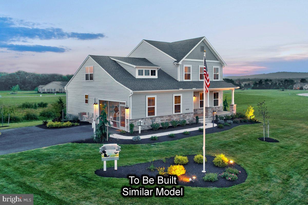 150 Old Tulpehocken Road Birdsboro, PA 19508 - Photo 3 of 24 a front view of a house with garden