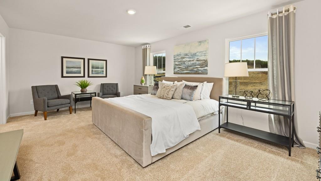 3869 Donetta Drive Atlanta, GA 30349 - Photo 16 of 49 a bedroom with a bed and a window