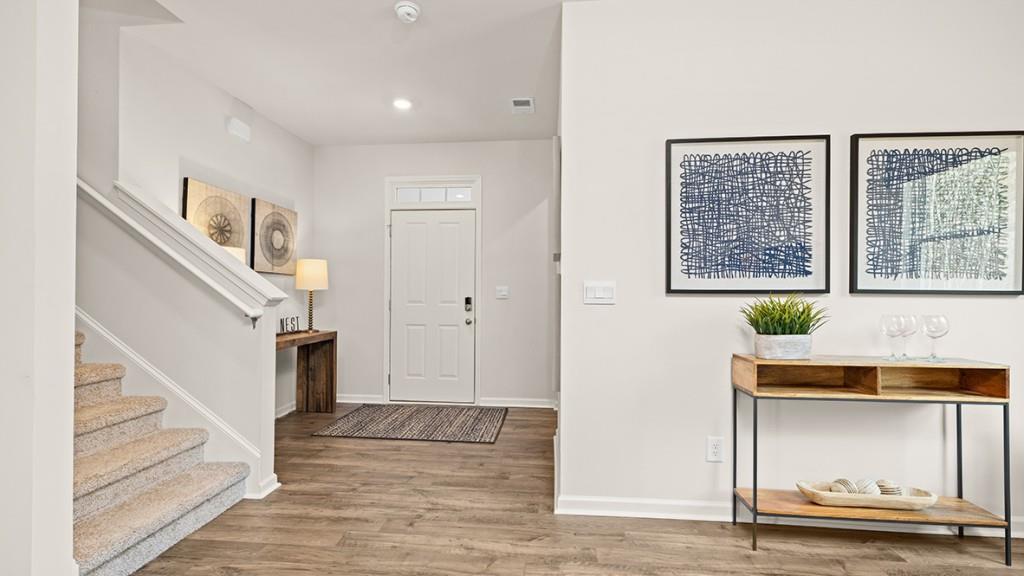 3869 Donetta Drive Atlanta, GA 30349 - Photo 3 of 49 a view of entryway and hall with wooden floor