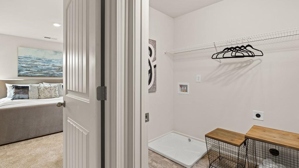 3869 Donetta Drive Atlanta, GA 30349 - Photo 39 of 49 a bathroom with a bathtub and shower