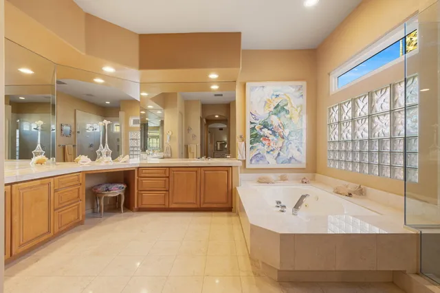 a view of storage and utility room with washer and dryer
