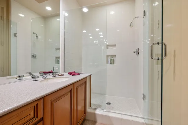 a view of a swimming pool with outdoor seating