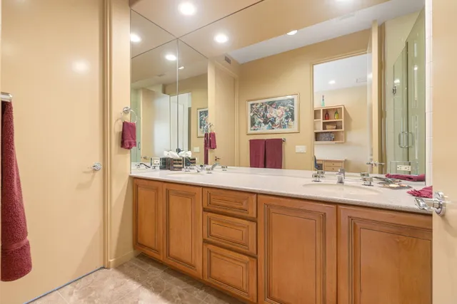 a view of a patio with table and chairs and potted plants
