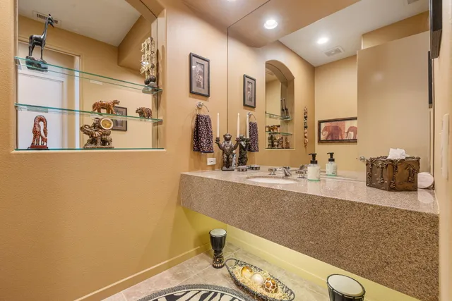 a view of a swimming pool with a lounge chairs