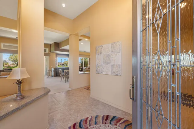 a view of a room with a large window