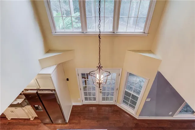 a view of a livingroom with furniture and front door