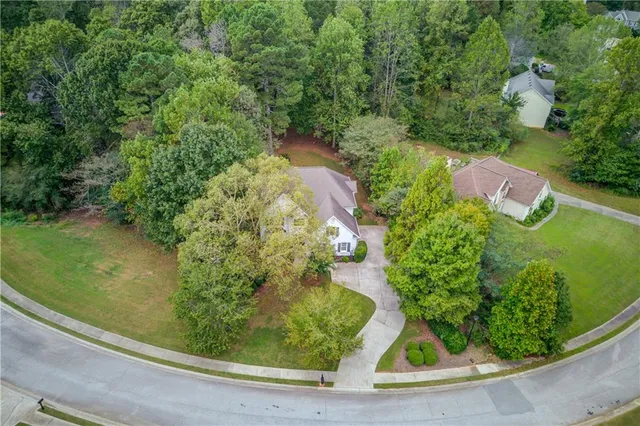 a view of a garden from a balcony