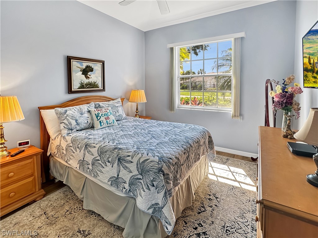 20631 Rivers Ford Estero, FL 33928 - Photo 11 of 18 a bedroom with a bed and a window