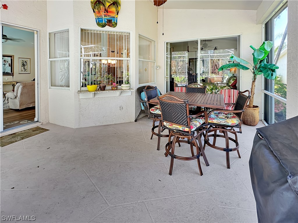 20631 Rivers Ford Estero, FL 33928 - Photo 14 of 18 a workspace with furniture and a potted plant
