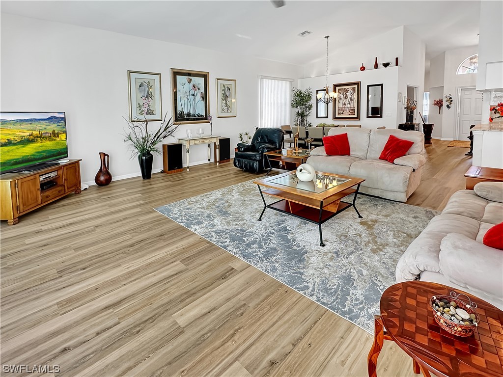 20631 Rivers Ford Estero, FL 33928 - Photo 6 of 18 a living room with furniture and a flat screen tv