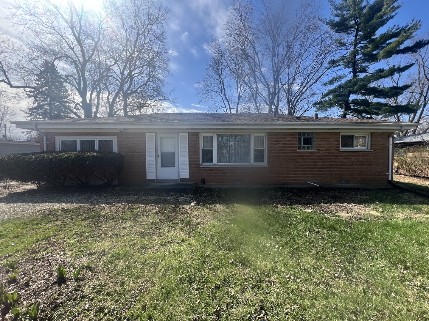 a house view with a garden space