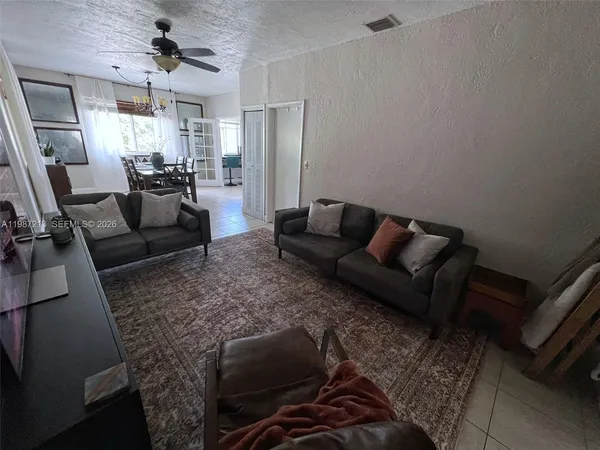 a living room with furniture and a couch