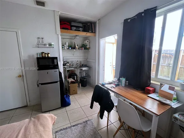 a room with a couch and a window