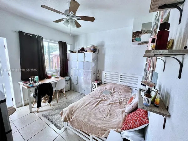 a bedroom with furniture and a bed