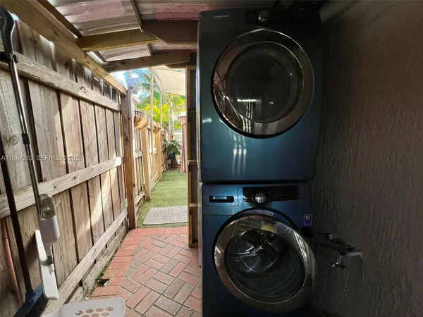 a utility room with dryer and washer