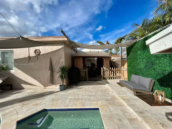 a view of a living room with furniture