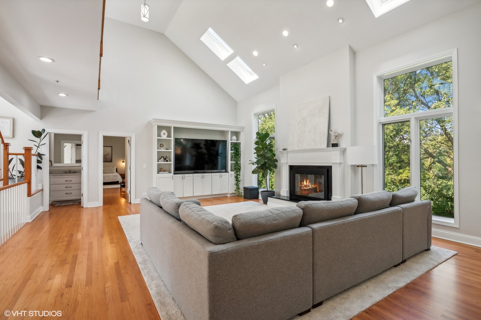 5807 Port Clinton Road Long Grove, IL 60047 - Photo 13 of 40 a living room with furniture fireplace and flat screen tv
