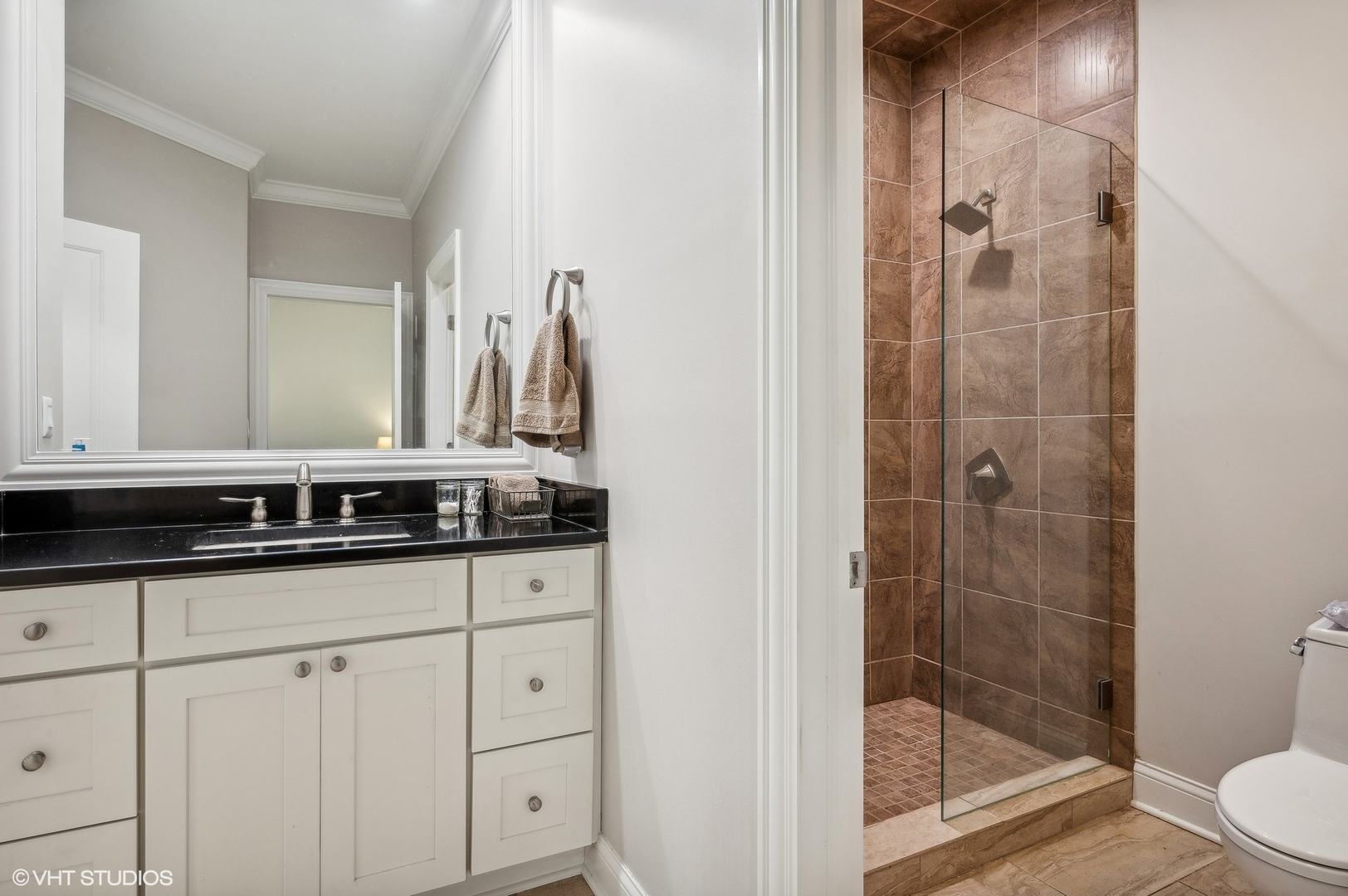 5807 Port Clinton Road Long Grove, IL 60047 - Photo 23 of 40 a bathroom with a granite countertop sink a mirror and a bathtub