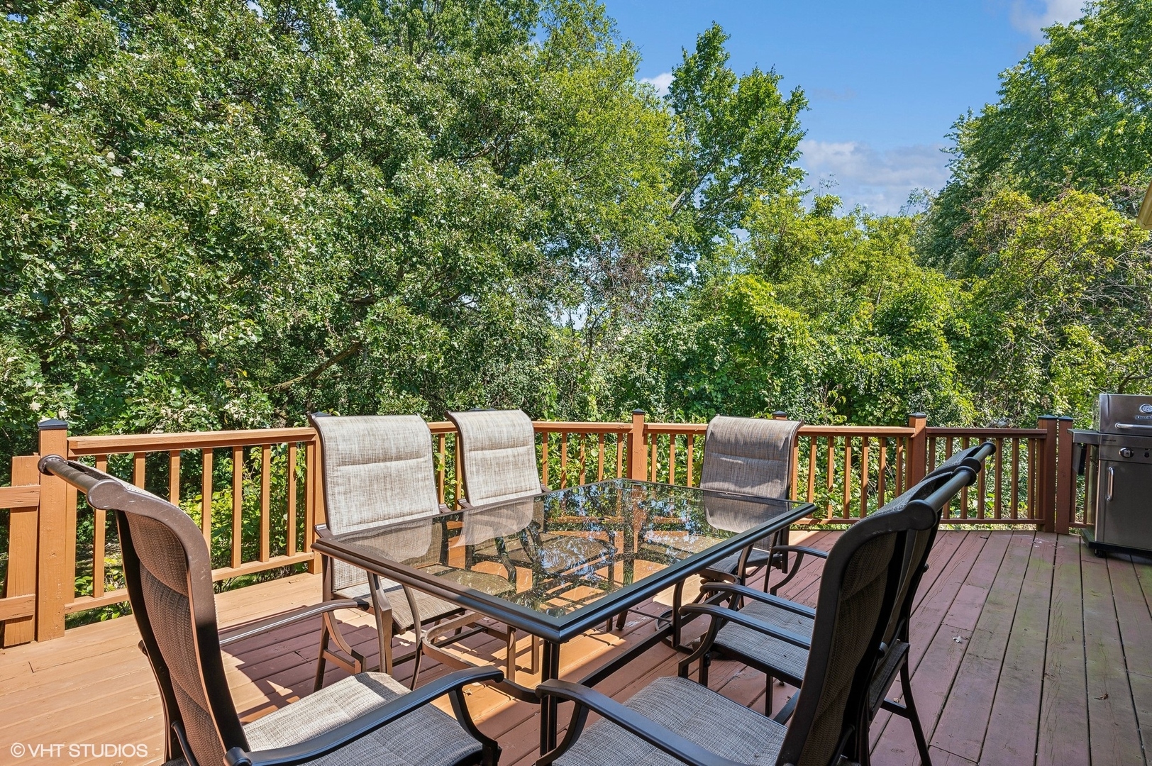 5807 Port Clinton Road Long Grove, IL 60047 - Photo 10 of 40 a view of a balcony with wooden floor and outdoor seating