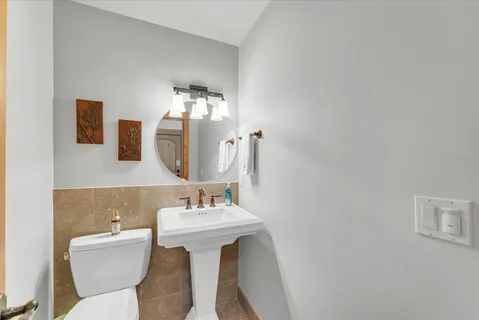 a view of a hallway with washer and dryer