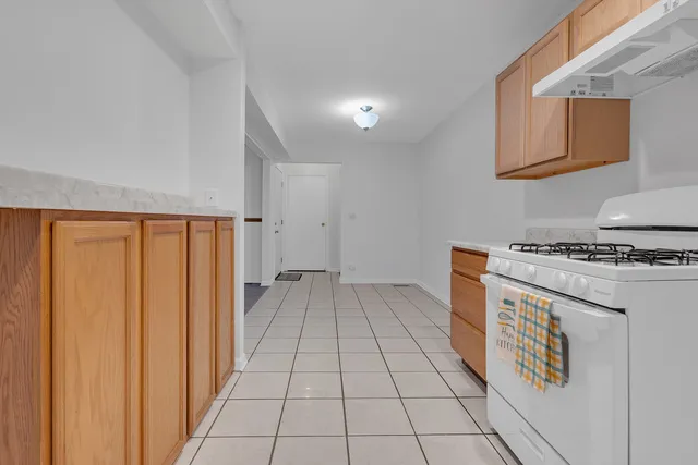a utility room with cabinets
