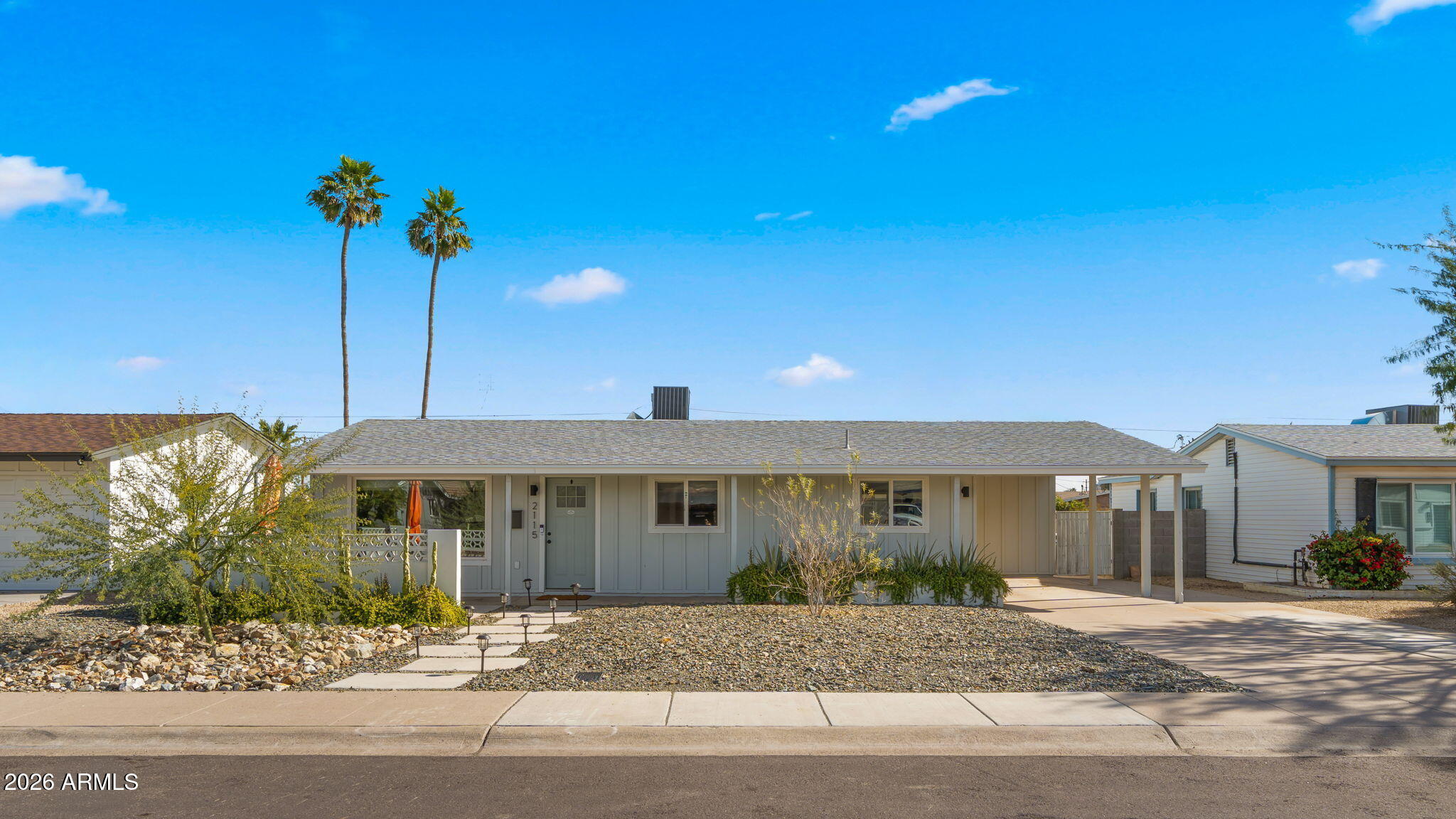 2115 North Normal Avenue Tempe, AZ 85288 - Photo 28 of 38 a front view of a house with a garden