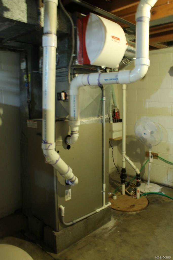 6544 General Squier Road Almont, MI 48003 - Photo 39 of 53 Basement area. Gas furnace with humidifier and sump pump.