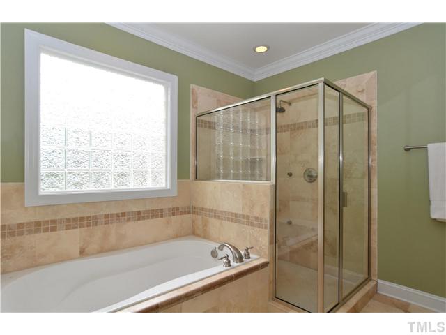 1623 Lorraine Road Raleigh, NC 27607 - Photo 11 of 23 The master bathroom is like your own private spa - complete with jetted whirlpool tub and oversized glass shower.