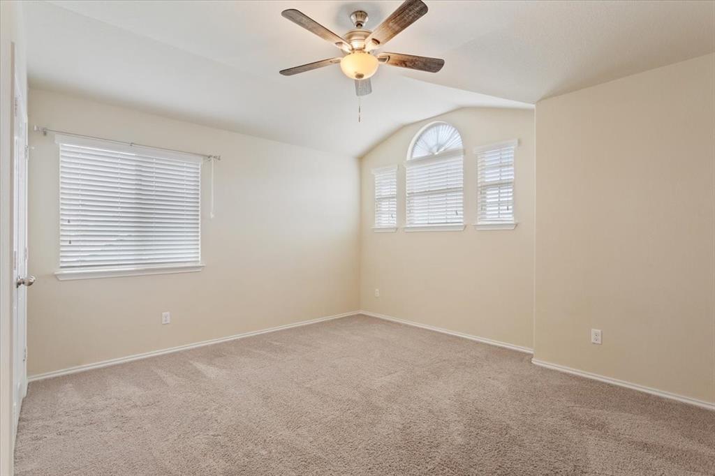 5300 Crossville Drive Waco, TX 76708 - Photo 19 of 33 an empty room with a window and a fan