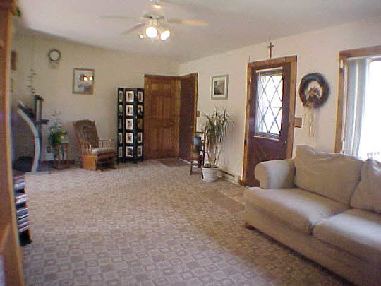 568 Baintree Road Lake Summerset, IL 61019 - Photo 2 of 6 a living room with furniture and a window