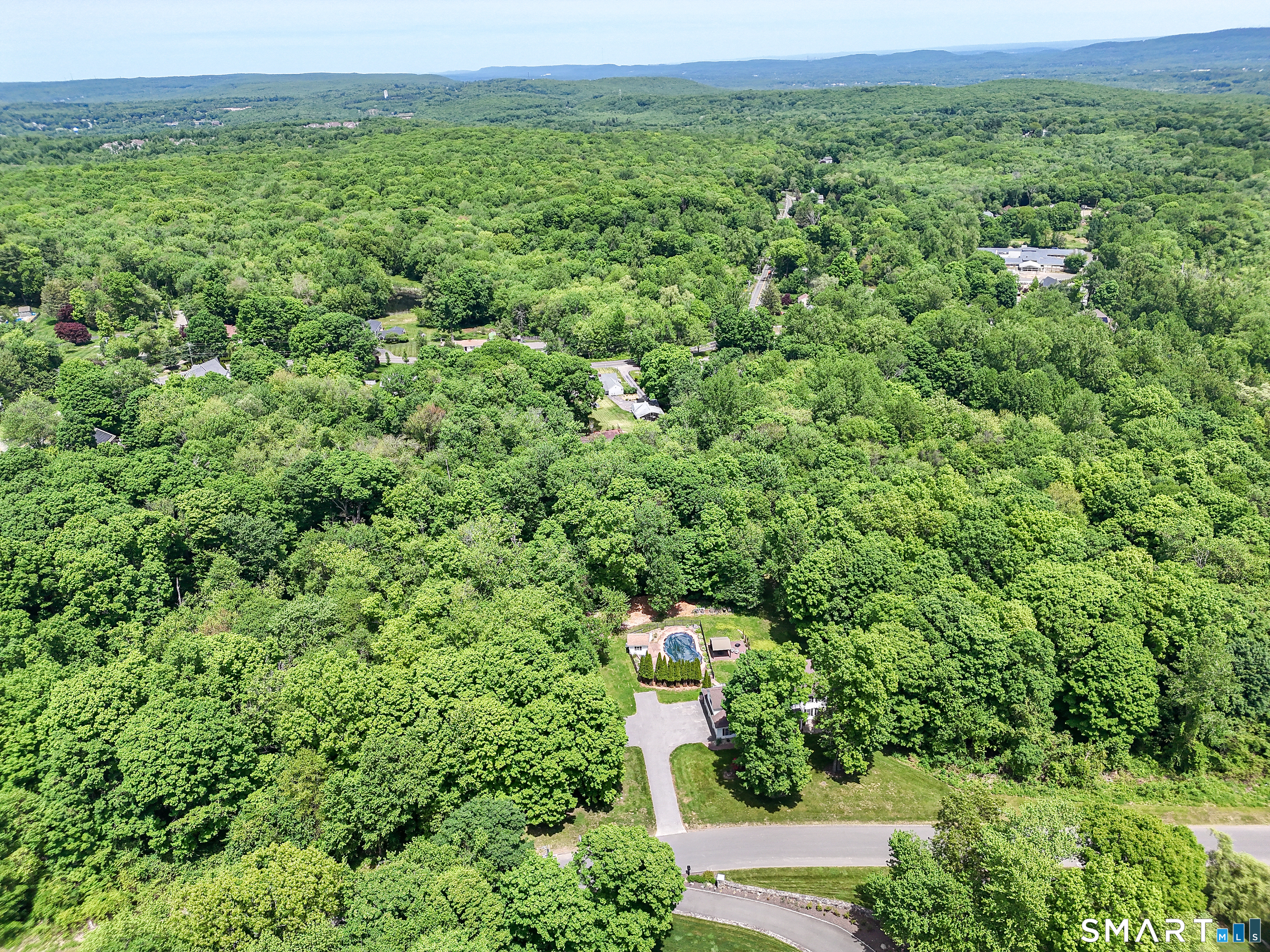 7 Holley Lane Prospect, CT 06712 - Photo 27 of 30 a view of a green field with lots of bushes