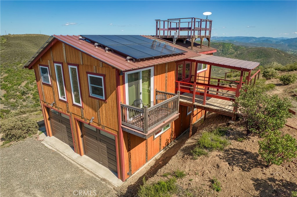 a front view of a house with balcony
