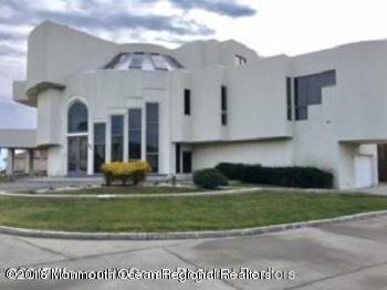 a view of house with yard and entertaining space