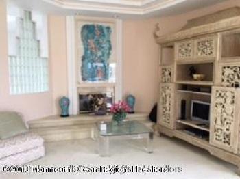 24 Clem Conover Road Deal, NJ 07723 - Photo 11 of 14 a living room with furniture and a fireplace