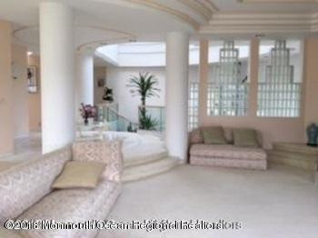 24 Clem Conover Road Deal, NJ 07723 - Photo 5 of 14 a living room with furniture and a potted plant