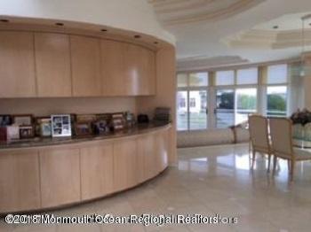 24 Clem Conover Road Deal, NJ 07723 - Photo 9 of 14 a kitchen with stainless steel appliances granite countertop a stove a cabinets a sink and a granite counter tops