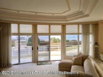 24 Clem Conover Road Deal, NJ 07723 - Photo 10 of 14 a living room with furniture and a large window