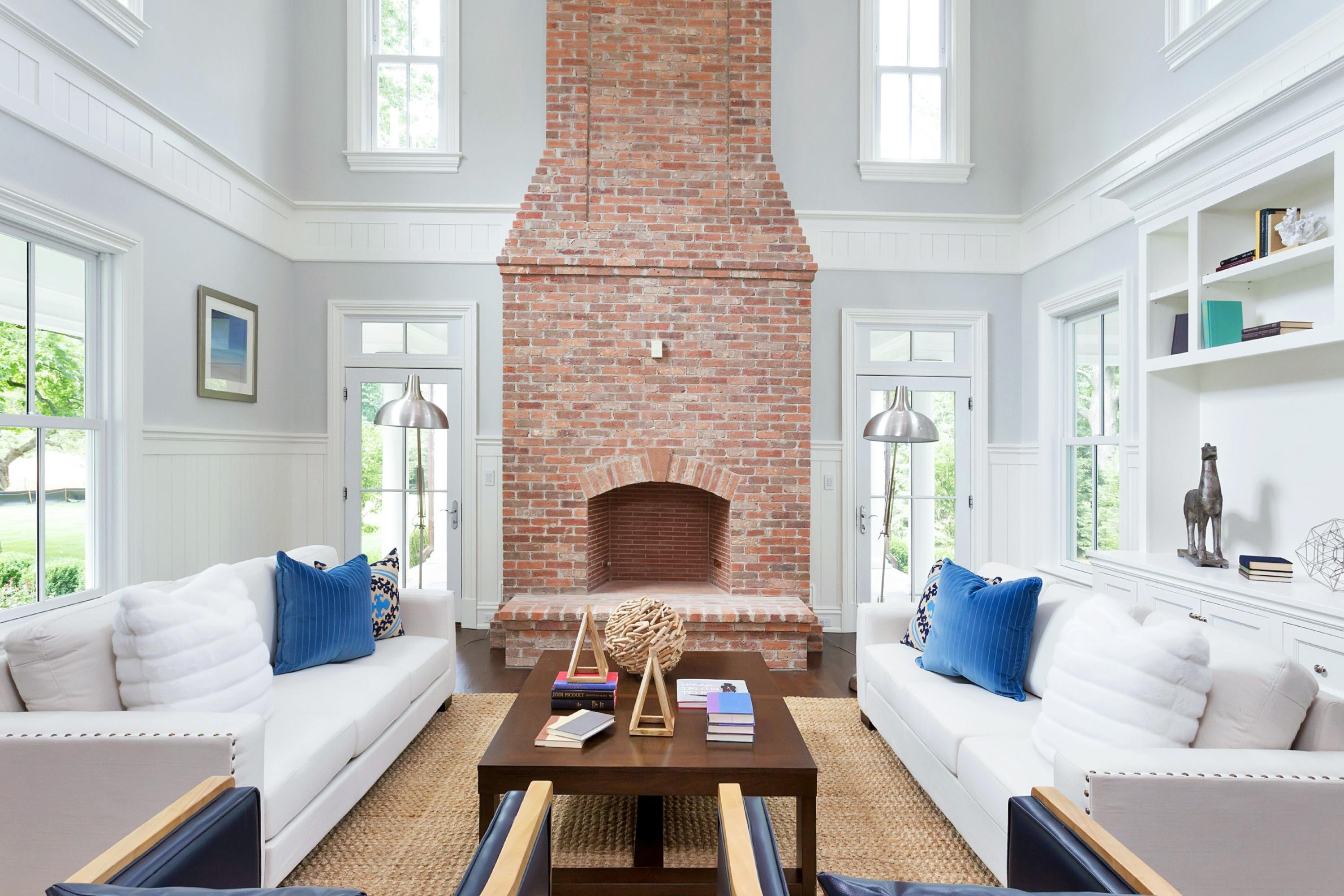 6 A Cross Road Darien, CT 06820 - Photo 12 of 24 a living room with furniture and a fireplace