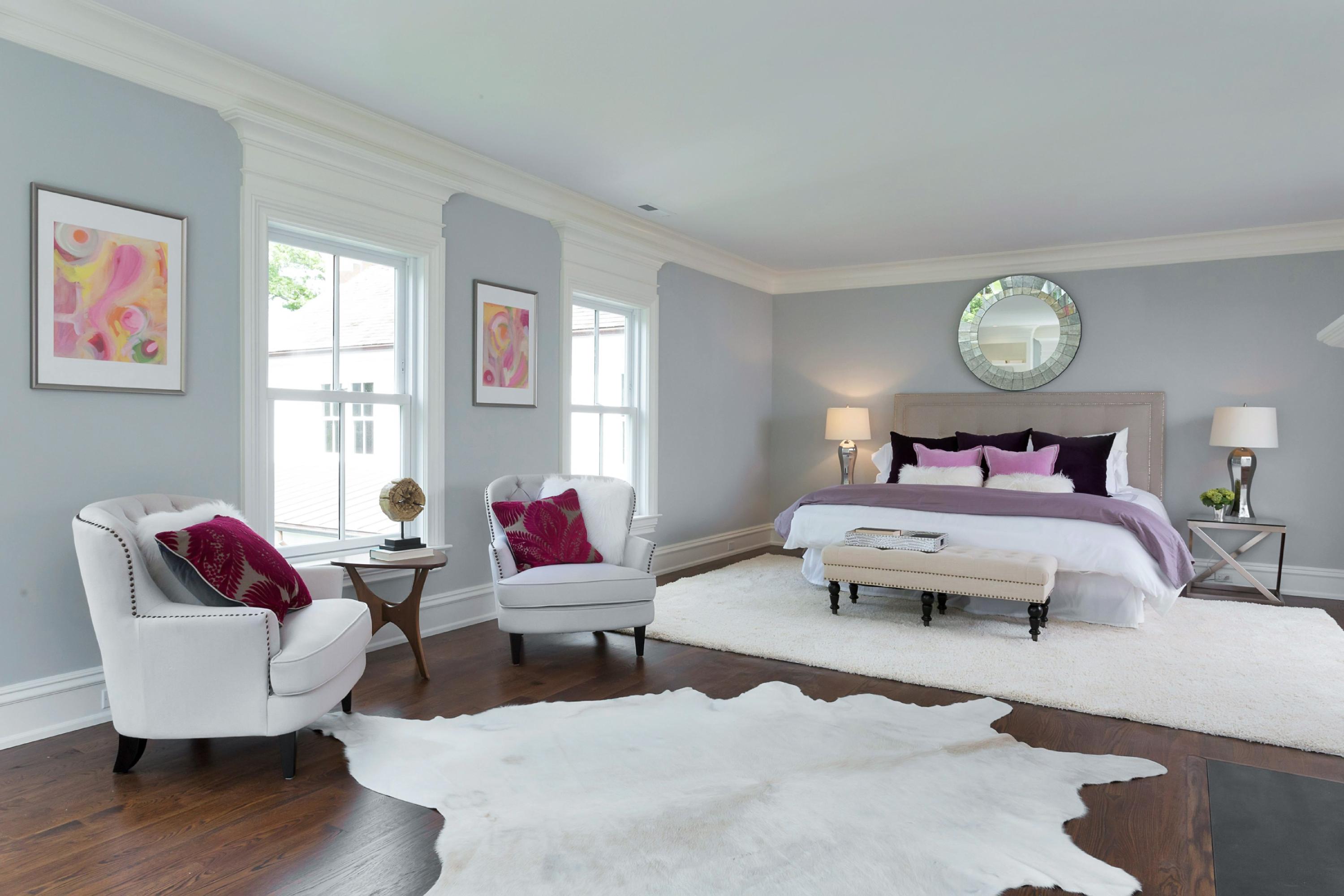 6 A Cross Road Darien, CT 06820 - Photo 15 of 24 a bedroom with a bed and wooden floor