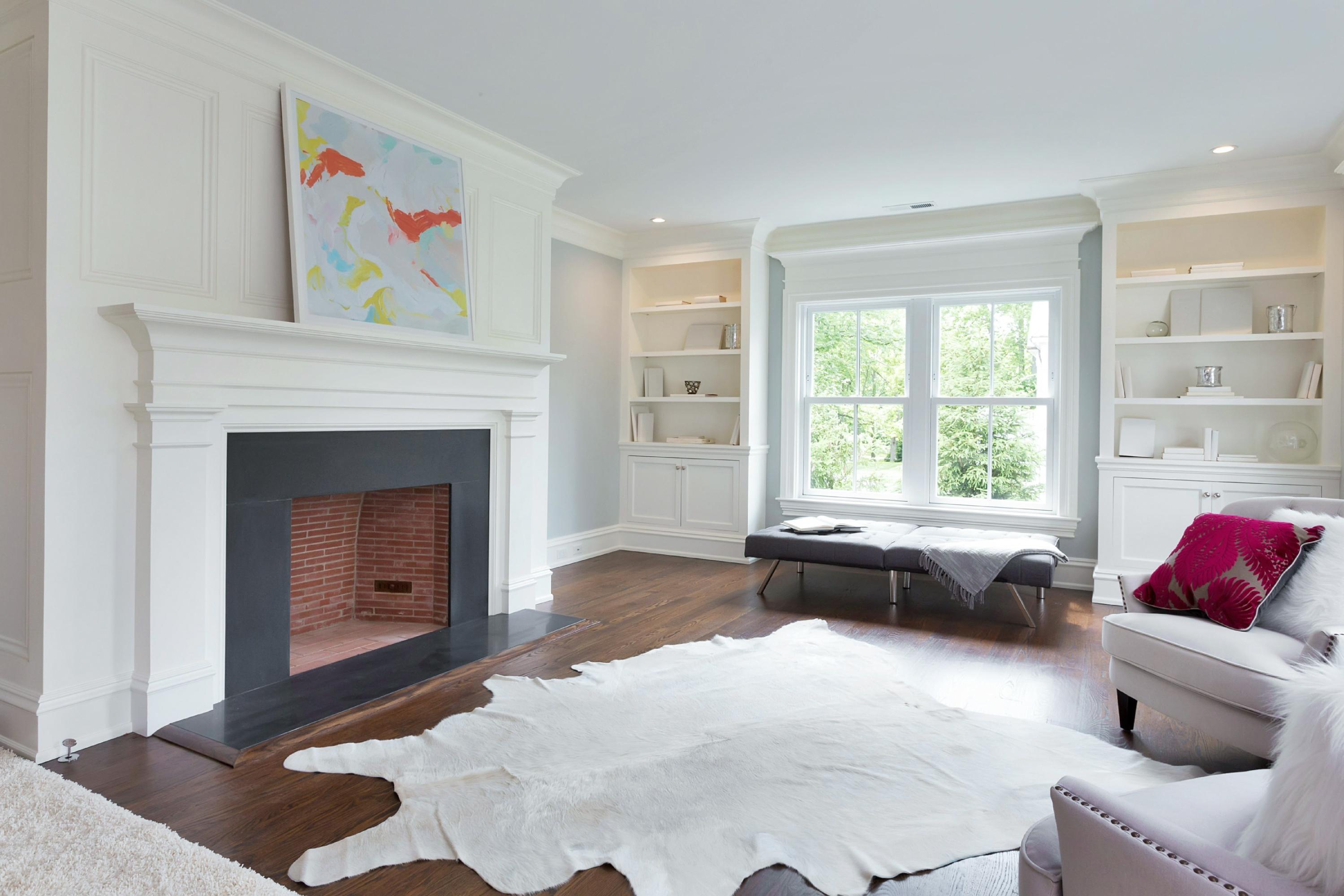 6 A Cross Road Darien, CT 06820 - Photo 16 of 24 a living room with furniture and a fireplace