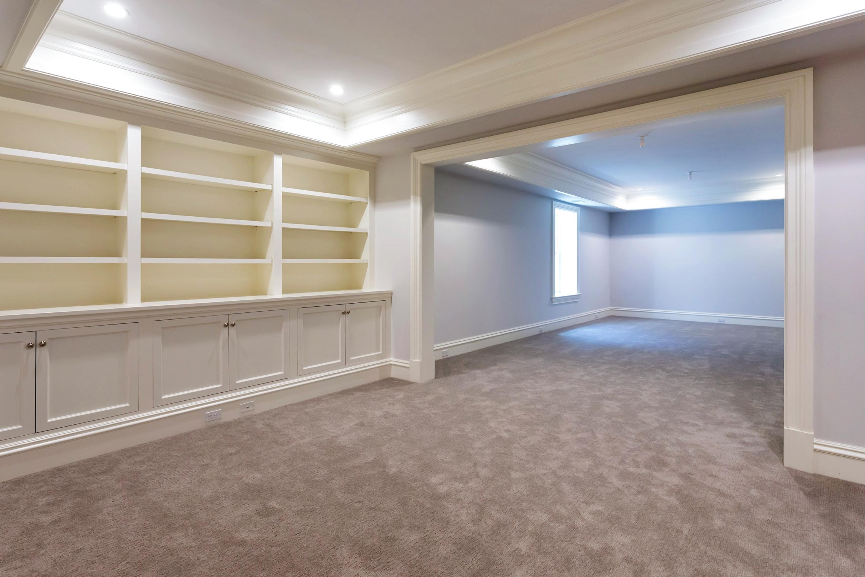 6 A Cross Road Darien, CT 06820 - Photo 19 of 24 a view of an empty room with a cabinet and mirrors